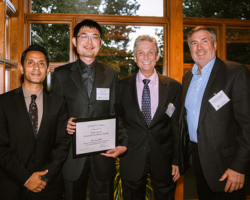 Bin Gu with Interim Dean Supratik Rayamajhi